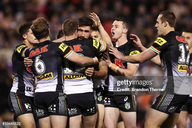 James Tamou of the Panthers celebrates with team mates after scoring a try during the round 18 NRL match between the Penrith Panthers and the Manly...