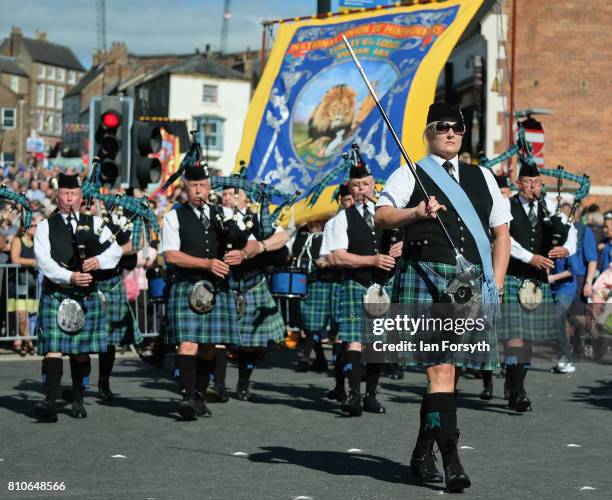 Pipe and drum colliery band plays as they march through the city during the 133rd Durham Miners Gala on July 8, 2017 in Durham, England. Over two...