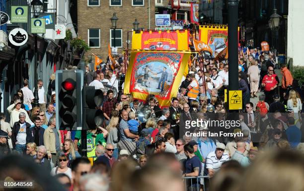Colliery brass bands and banners make the procession through Durham city during the 133rd Durham Miners Gala on July 8, 2017 in Durham, England. Over...
