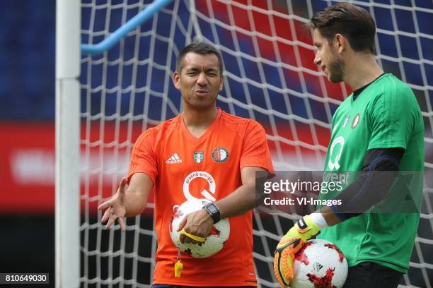 Coach Giovanni van Bronckhorst, keeper Brad Jones of Feyenoord during a training session at The Kuip on July 08, 2017 in Rotterdam, The Netherlands