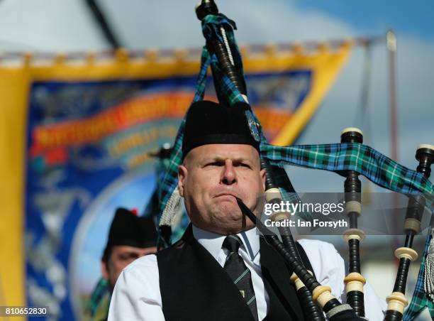 Piper in a pipe and drum colliery band plays as they march through the city during the 133rd Durham Miners Gala on July 8, 2017 in Durham, England....
