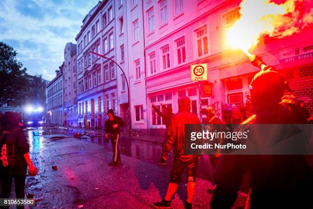 Anti-G20 Summit protesters during clashes with riot police on July 7, 2017 in Hamburg, Germany. Authorities are braced for large-scale and disruptive...