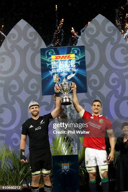 All Black captain Kieran Read and Lions captain Sam Warburton pose with the series trophy following the drawn Test match between the New Zealand All...