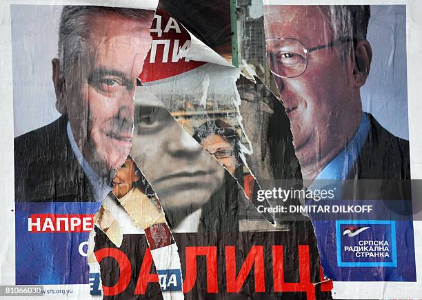 Picture shows ripped pre-election posters of Vojislav Seselj, currently on trial in The Hague for war crimes, leader of the hard-line nationalist...