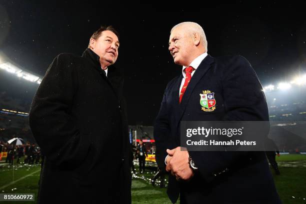 Head coach Steve Hansen talks with head coach Warren Gatland of the Lions the Test match between the New Zealand All Blacks and the British & Irish...