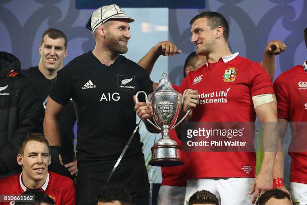 All Black captain Kieran Read and Lions captain Sam Warburton pose with the series trophy following the drawn Test match between the New Zealand All...