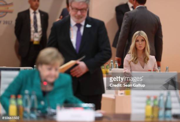 Ivanka Trump looks on as German Chancellor Angela Merkel arrives for the morning working session on the second day of the G20 economic summit on July...