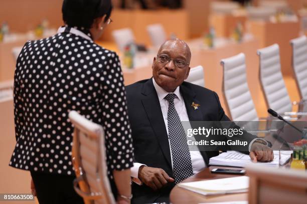 South Afrcian President Jacob Zuma arrive for the morning working session on the second day of the G20 economic summit on July 8, 2017 in Hamburg,...