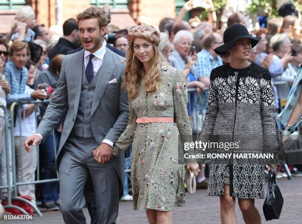 Pierre Casiraghi, son of Princess Caroline of Hanover , his wife Beatrice and his sister Charlotte Casiraghi arrive for the church wedding of Prince...