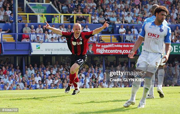 Fulham's English Midfielder Danny Murphy celebrates scoring a goal during their Premier League match against Portsmouth at Fratton Park, in...