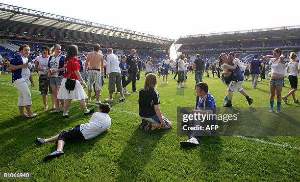 Birmingham City fans invade the pitch after the team's English Premiership soccer match against Blackburn at Birmingham's St Andrew's stadium on May...