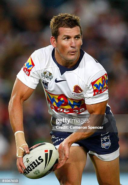 Shane Perry of the Broncos offloads the ball during the round two NRL match between the Sydney Roosters and the Brisbane Broncos at the Sydney...