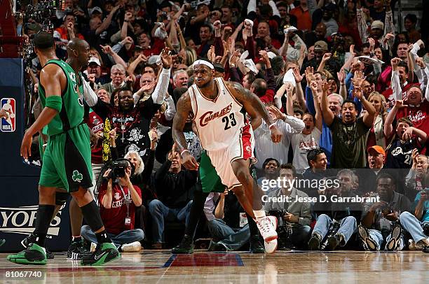 LeBron James of the Cleveland Cavaliers reacts after he dunk over Kevin Garnett of the Boston Celtics in Game Four of the 2008 NBA Eastern Conference...