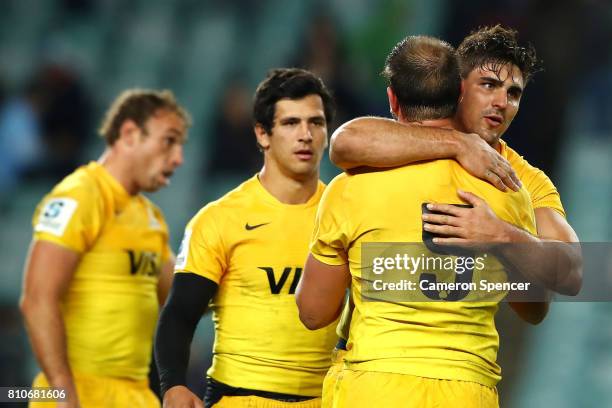 Benjamin Macome and Pablo Matera of the Jaguares embrace after winning the round 16 Super Rugby match between the Waratahs and the Jaguares at...