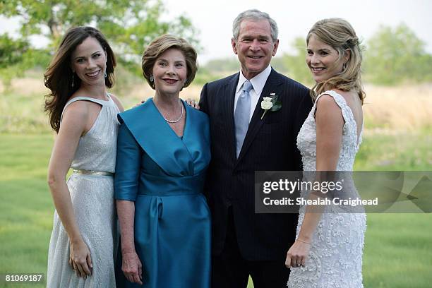 In this handout image provided by the White House, U.S. President George W. Bush and Mrs. Laura Bush pose with daughters Jenna and Barbara prior to...