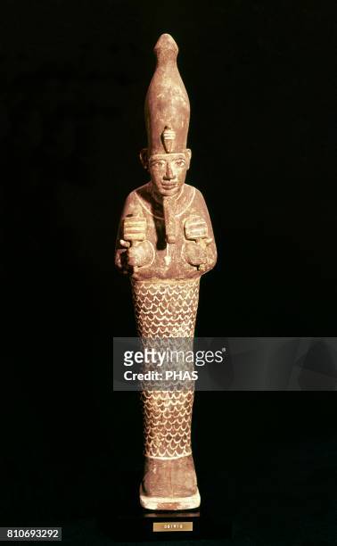Osiris. Polychrome sculpture. Egyptian art.