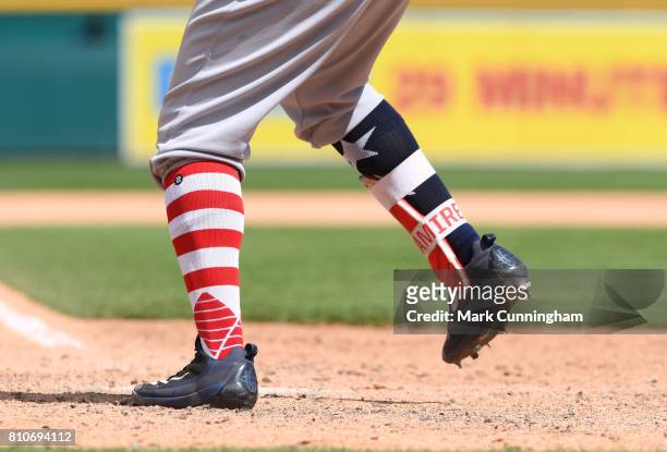 Detailed view of the special red, white and blue socks worn by Jose Ramirez of the Cleveland Indians in honor of Independence Day Weekend as he bats...