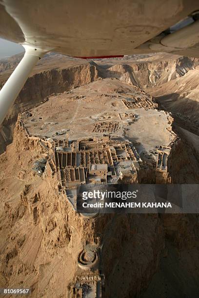 An aerial photo taken on May 13, 2008 shows the ancient hilltop fortress of Masada in the Judean desert. US President George W. Bush will visit the...