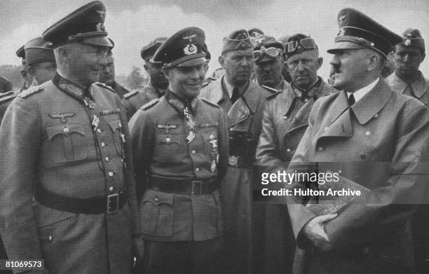 Nazi leader Adolf Hitler with Wehrmacht Field Marshal Gunther von Kluge and Commander of the 7th Panzer Division Erwin Rommel , France, circa 1940.
