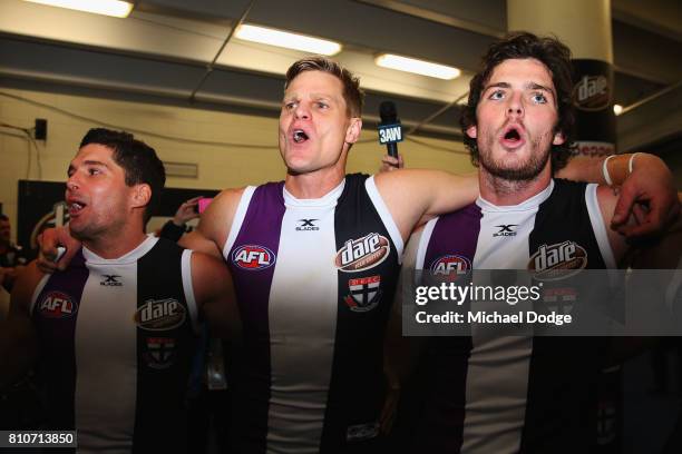 Nick Riewoldt of the Saints celebrates the win with Leigh Montagna and Dylan Roberton during the round 16 AFL match between the St Kilda Saints and...