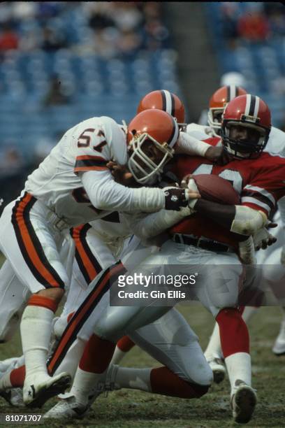 Linebacker Clay Matthews of the Cleveland Browns hits running back Gerald Riggs of the Atlanta Falcons in Atlanta Fulton-County Stadium on November...