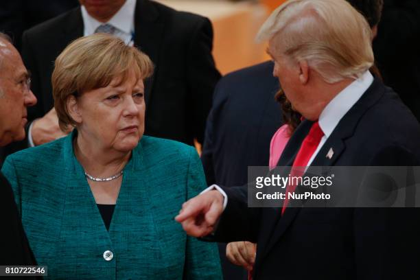 President Donald Trump is seen with German chancellor Angela Merkel ahead of the thrid plenary session of the G20 summit in Hamburg, Germany on 8...