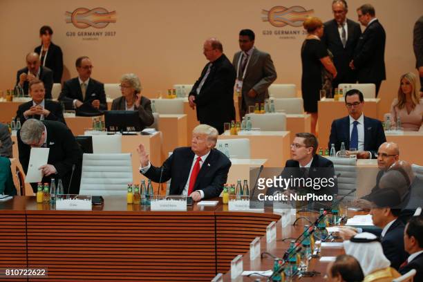 President Donald Trump is waving at Indian PM Narendra Modi ahead of the third plenary session of the G20 summit in Hamburg, Germany on 8 July, 2017.