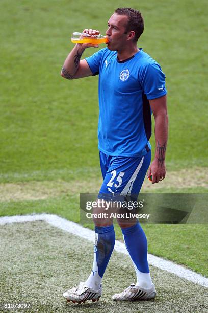 Fernando Ricksen of Zenit St. Petersburg has a drink during the Zenit St.Petersburg training session ahead of the UEFA Cup Final at the City of...