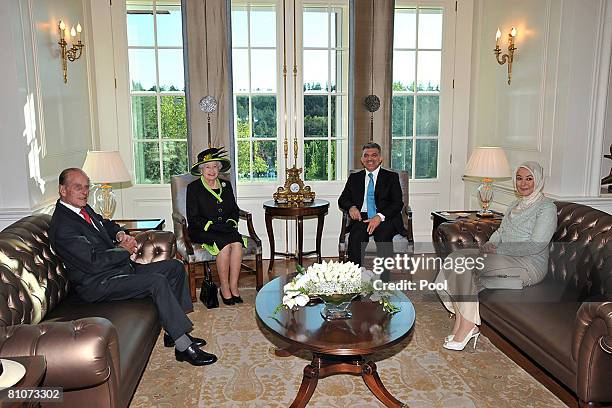 Britain's Prince Philip, Duke of Edinburgh, Queen Elizabeth II, Turkey's President Abdullah Gul and his wife Hayrunisa Gul pose before their meeting...