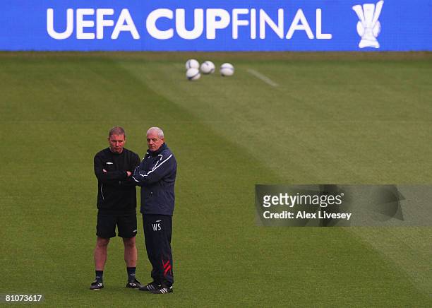 Walter Smith , Coach of Glasgow Rangers talks to Ally McCoist, assistant coach of Glasgow Rangers during the Glasgow Rangers training session ahead...