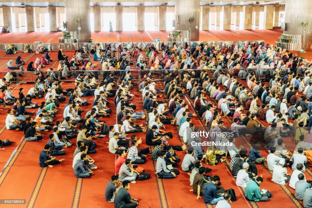 Muslim People praying in Istiqlal Mosque, Jakarta, Indonesia
