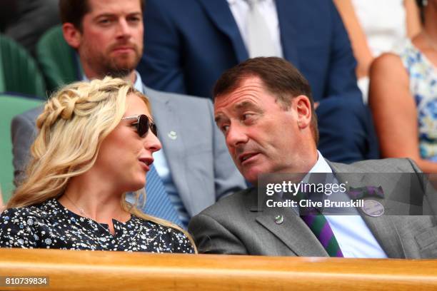 Laura Kenny adn Philip Brook in discussion in the centre court royal box on day six of the Wimbledon Lawn Tennis Championships at the All England...