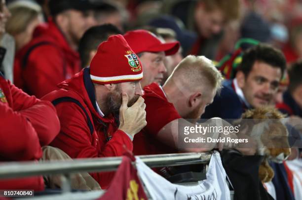 Nervous Lions fans look on during the Test match between the New Zealand All Blacks and the British & Irish Lions at Eden Park on July 8, 2017 in...