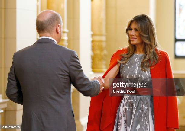 First Mayor of Hamburg Olaf Scholz welcomes Melania Trump, wife of US President Donald Trump, prior to the partner program of G20 summit on the...
