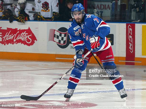 Ben Shutron of the Kitchener Rangers fires a pass in game 7 of the OHL Championship final against the Belleville Bulls on May 12, 2008 at the...