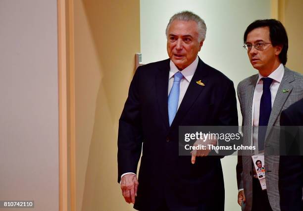 Brazilian President Michel Temer arrives for the morning working session on the second day of the G20 economic summit on July 8, 2017 in Hamburg,...