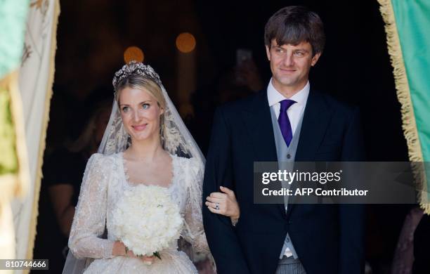 Ekaterina of Hanover and Prince Ernst August of Hanover leave after their church wedding ceremony in Hanover, central Germany, on July 8, 2017....