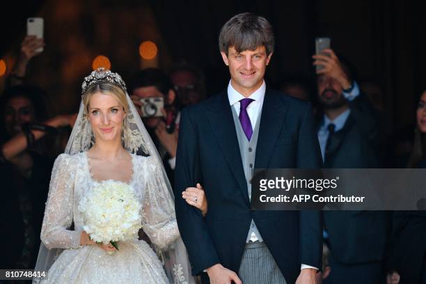 Ekaterina of Hanover and Prince Ernst August of Hanover leave after their church wedding ceremony in Hanover, central Germany, on July 8, 2017....