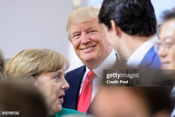 President, Donald Trump speaks with Candian Prime Minister Justin Trudeau during a panel discussion titled 'Launch Event Women's Entrepreneur Finance...