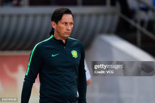 Head coach of Beijing Guoan Roger Schmidt looks on during the 16th round match of 2017 Chinese Football Association Super League between Beijing...