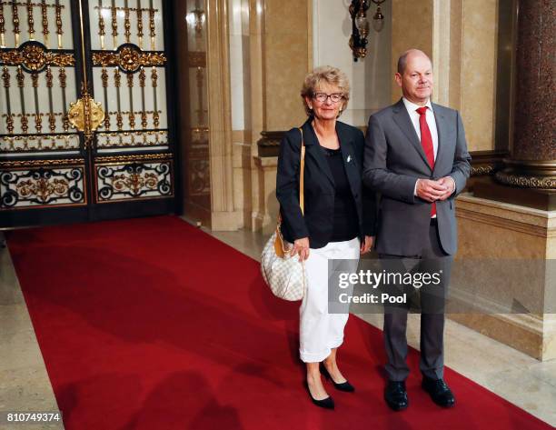 First Mayor of Hamburg Olaf Scholz welcomes Christiane Frising , wife of President of the European Commission Jean-Claude Juncker, during the partner...