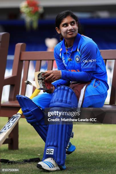 Mithali Raj, captain of India reads a book ahead of her batting innings during the ICC Women's World Cup 2017 match between South Africa and India at...