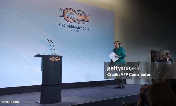 German Chancellor Angela Merkel arrives for the final press conference on the second day of the G20 Summit in Hamburg, Germany, July 8, 2017. Leaders...