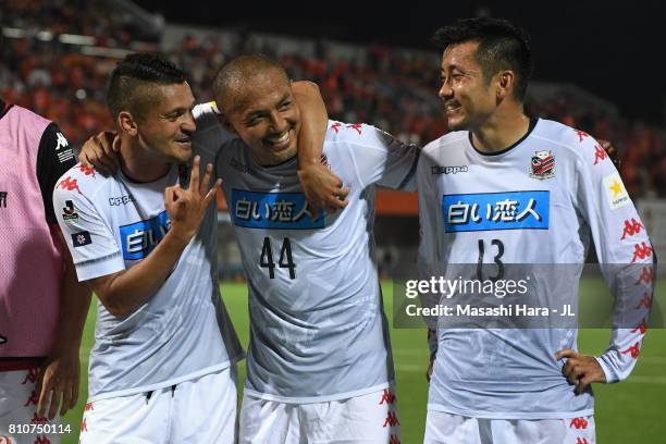 Reis, Shinji Ono and Yoshihiro Uchimura of Consadole Sapporo react after their 2-2 draw in the J.League J1 match between Omiya Ardija and Consadole...