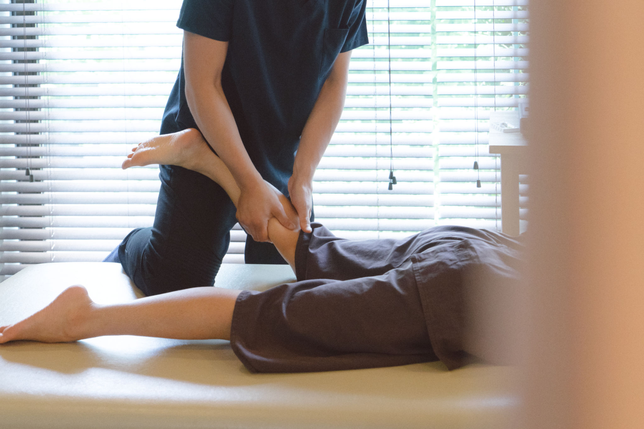 Patient receiving chiropractic treatment Patient receiving chiropractic treatment
