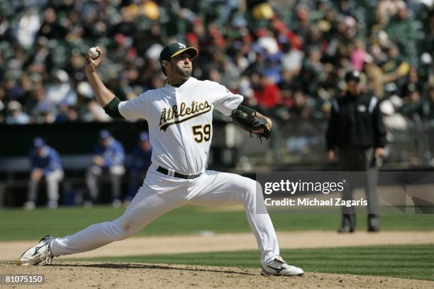 Andrew Brown of the Oakland Athletics pitches during the game against the Kansas City Royals at the McAfee Coliseum in Oakland, California on April...