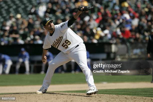 Andrew Brown of the Oakland Athletics pitches during the game against the Kansas City Royals at the McAfee Coliseum in Oakland, California on April...