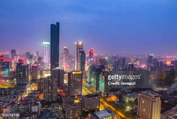 cityscape and skyline of modern city at night - nanjing stock pictures, royalty-free photos & images