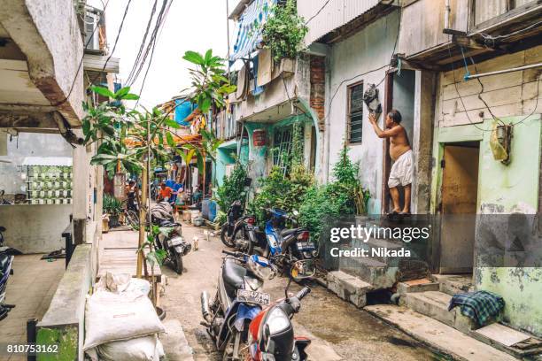 jakarta backstreet, indonesia - jakarta slum stock pictures, royalty-free photos & images