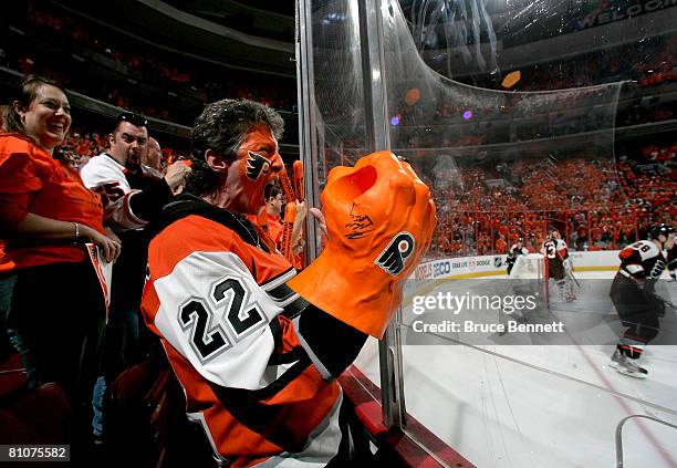 Philadelphia Flyers fan cheers on his team during warm ups before game three of the Eastern Conference Finals of the 2008 NHL Stanley Cup Playoffs...